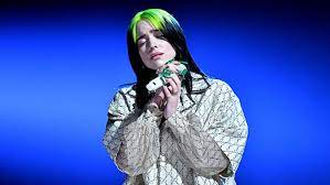 They matched in white suits and had a sweet moment when the song was over and he applauded her. Billie Eilish Releases No Time To Die Grammy Com
