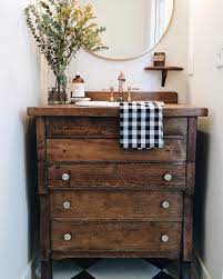 You also might notice the mirror on top of the repurposed dresser and bathroom vanity. Farmhouse Style Wooden Dresser Bathroom Vanity Perfect For A Farmhouse Bathroom Bathroomideas Interior Dresser Vanity Bathroom Home