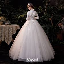 From long sleeves to luxurious velvet styles we've rounded up the best bridesmaid dresses for a winter wedding for every bridal style and budget. Affordable Ivory Outdoor Garden Winter Wedding Dresses 2021 Ball Gown V Neck Long Sleeve Appliques Lace