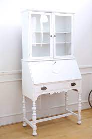 In the dining room, a secretary desk with a glass hutch is a lovely way free up space in your kitchen and display special occasion items. Antique Secretary Desk Hutch Flip Desk Writing Desk With Vintage Key Shopgoldenpineapple