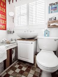 An aqua colored bathroom with lots of ledges along the walls and starfish and seashells plus gold touches. 31 Nautical Coastal Beach Bathroom Decor Ideas Sebring Design Build