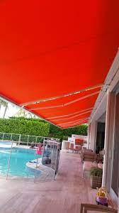Three Butting Side By Side Full Cassette Fully Enclosed Folding Lateral Arm Retractable Awnings Installed At A Outdoor Decor Miami Beach Retractable Awning