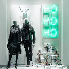 Ho Ho Ho Neon Lights With A Deer Head Hand Crafted Out Of Paper Store Carsch Haus Kaufhof C Christmas Window Display Christmas Window Store Window Display