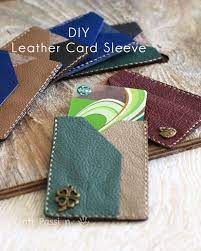 Decorate the outside of the card sleeve using markers and stickers. Leather Card Sleeve Free Tutorial Craft Passion Sewing Leather Leather Diy Leather Gifts