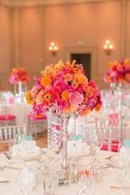 Lovely Centerpiece In Pink Fuchsia Coral Orange And Pink Wedding Orange Wedding Centerpieces Wedding Centerpieces