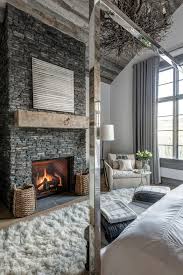 A wall mounted tv can be seen high on the wall above the inset fireplace and unique mirrored chest of drawers. 80 Fabulous Fireplace Design Ideas For Any Budget Or Style Hgtv