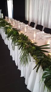 Tropical Seaside Bridal Table Candles Layered Greenery Bridal Table Wedding Reception Decorations Reception Decorations