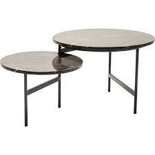 This round coffee table design features a glass tabletop over an openwork base with a modified circular motif. Round Coffee Table In Brown Marble Original Small Side Table