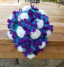 Orchid, anthurium and ranunculus bouquet for wedding in kapalua, hawaii. Galaxy Orchid Bridal Bouquet Turquoise Blue Island Orchid Etsy In 2021 Blue Orchid Bouquet Orchid Bridal Bouquets Purple Wedding Theme