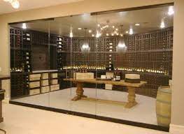 You can even set the doors to unlock with your iphone! Glass Enclosed Wine Cellar Design Ideas Get A Free Design Glass Doors Cabinets And Walls