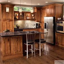 This Rustic Birch Cabinetry With A Praline Finish Adds A Rugged Element To This Modern Kitchen Small Rustic Kitchens Kitchen Design Small Kitchen Design