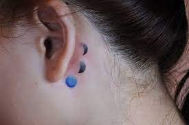 A Small Moon Phases Tattoo Behind The Left Ear Moon Phases Tattoo Small Moon Tattoos Tattoos