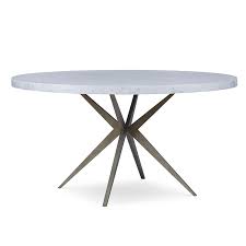 Round tables encourage conversation and offer more clearance space. Atlantis Dining Table Mr Brown London