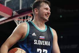 Slovenia's luka doncic celebrates at the end of a men's basketball preliminary round game against spain at the 2020 summer olympics, sunday, aug. Mfnsotewyk5ym