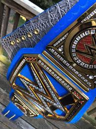 I think just world championship and universal championship on the bottom where it currently you could argue it the other way, that naming the universal title after the wwe universe makes it i am down with the belt being similar to the wwe title with red instead of blue. Wwe Universal Championship Belt Custom Real Leather 1880456952