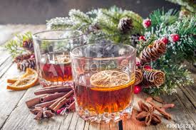 Christmas cocktail & drink recipes. Christmas Winter Alcohol Drink Orange Spice And Bourbon Whiskey Alcoholic Cocktail In Two Glasses Wooden Background With Christmas Tree Branches And Decor Copy Space Stock Photo Adobe Stock