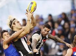 With treloar out, sidebottom played fb: Magpies Cruise To Afl Win Over Dismal Dees South Coast Register Nowra Nsw