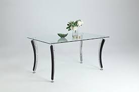 An interesting take on industrial modern design, this rectangular dining table is full of bold visuals. Milan Dt Yvette Clear Black Rectangular Dining Table Buy Online In Angola At Angola Desertcart Com Productid 69370918