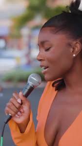 Sevana does Bob Marley cover by a bus stop