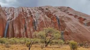Visitors to uluru were treated to the rare sight of waterfalls cascading down the rock on october 19. 10 News First Adelaide Uluru Waterfalls Facebook