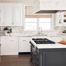 I have a concrete foundation with 2nd floor bed/bath above, and will be trying to take out 3 walls surrounding kitchen and make large island with stove in center. Kitchen Island Gas Cooktop Design Ideas
