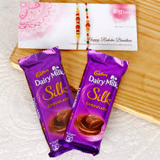 A glass of milk is as american as apple pie. Set Of 2 Rakhis With 2 Dairy Milk Silk Chocolates Gift Send Rakhi Gifts Online Hd1038890 Igp Com