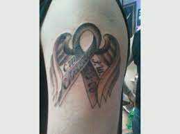 Lovely tattoos on body graphic of cancer ribbon tattoo designs image. Pin On Tattoo
