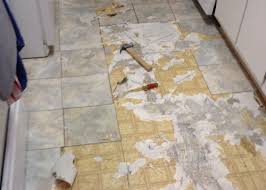 tearing out old kitchen flooring