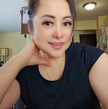 Hello my name is Ka Nao Yang. I graduated at Metropolitan State University  with my bachelors in business administration. I'm licensed realtor at  Realty Group LLC. I buy and sell houses. I