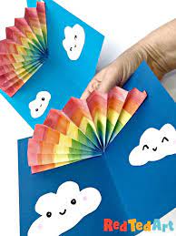 Draw a design on this white paper and paste it on the colored fold with a frame all around. Easy Pop Up Card How To Projects Red Ted Art Make Crafting With Kids Easy Fun Babysitting Crafts Kids Craft Cards Paper Crafts Diy Kids