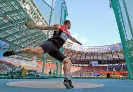 The discus is a circular object held in the tips of the fingers by an athlete standing in a circle, initially facing away from the landing area or sector. Discus Throw Shot Put And Track Field Home Facebook