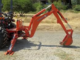 This backhoe excavator attachment is ideal for farming, construction, landscaping, and agriculture. West Auctions Auction Complete Farm Liquidation Item Kubota Bh77 Backhoe Attachment