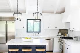A dingy kitchen gets a bright, white makeover 14 photos. White L Shaped Kitchen With Blue Island Transitional Kitchen