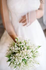 To press the flowers in your wedding bouquet, select as many flowers as you'd like, or even the entire bouquet as pictured here, and spread them out on clean wax paper so they will lift easily after pressing. Wedding Bouquets Romantic White Wax Flower Bouquet Www Stylemepretty Photography Stefano S Wedding Lande Leading Wedding Magazine Ideas Inspirations The Hottest New Wedding Trends