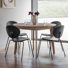 Solid craftsmanship, intricate details and added extras to take your dining room (and entertaining game) to the next level. Fareham Round Dining Table Natural With Grey Wash Interiors Online