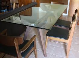 Available in different natural finishes, this table will be able to match different color schemes. Modern Dining Table With Mid Century Modern Chairs Picked Vintage