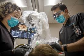 West Hartford oral surgeon has help when drilling implants. Meet his robotic assistant. – Hartford Courant