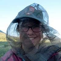 Dr. Alisa Wade, University of Montana, collects a sample