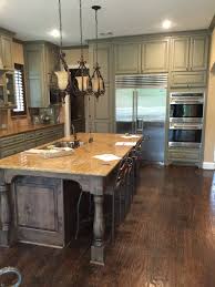 Rather than upper cabinets for wall storage, designers opted for open shelving that was crafted out of materials that. Before After A Dark Gold Toned Home Gets A Fresh New Look Designed