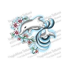 The dolphin is supposed to denote prosperity and act as a guiding force. Tattoo Art Flash Design Dolphin Flowers By Veggiemusetattoos 9 95 Dolphins Tattoo Art Tattoo Dolphin Coloring Pages