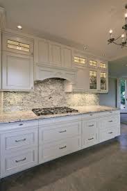 Remove the leaded glass panels from the existing frames. Light Airy Kitchen With Leaded Glass Front Cabinets And Under Cabinet Lighting Hgtv