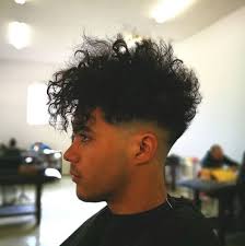 The high skin fade makes the fohawk disconnected from the sides. 7 Wearable Curly Faux Hawk Styles For Men How To 2021