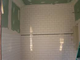 Jeffrey court carrara white 2.5 in. Tile Gurus Chair Rail In Middle With Subway To Ceiling