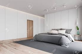 Buy bedroom carpets at carpetright, the uk's largest carpet retailer. Corner Of Modern Master Bedroom With White Walls Wooden Floor Stock Photo Picture And Royalty Free Image Image 125502239