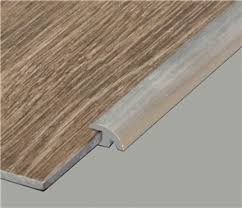 I would just do the vinyl in the main living areas and keep carpet in the bedrooms. Carpet Vinyl Bare Floor Transitions Look Floors