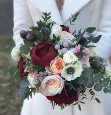 Maybe you would like to learn more about one of these? December Bride Winter Bridal Bouquets Wedding Flowers Flower Arrangement Designs
