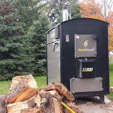 Wood burning stove with cook top and oven and interior water jacket. Outdoor Wood Fired Boiler Wikipedia