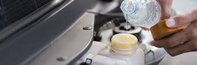 When should i add coolant to my overflow tank? How To Put Water In Your Car S Radiator Axa Insurance