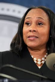 Prosecutor asks judge to revoke bond for Harrison Floyd in Georgia election  case