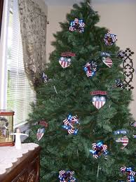 Keeping My Christmas Tree Up All Year Round And Decorating It For Each Holiday Or Season Christmas In July Holiday Tree Holiday Christmas In July